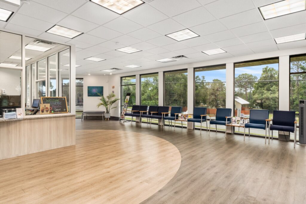 Bright clinic lobby with large windows
